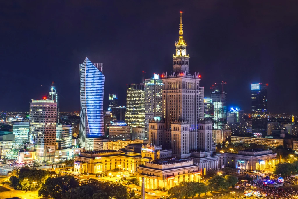 Night view of Warsaw skyline with the illuminated Palace of Culture and Science